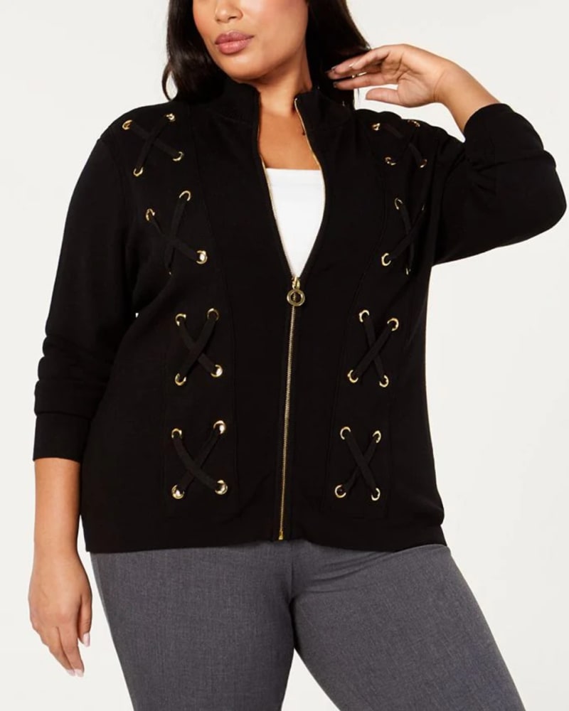 Front of a model wearing a size 1X Belldini Women's Label Plus Laced Grommet Detail Sweater Black Size 1X in Black by Belldini. | dia_product_style_image_id:314584